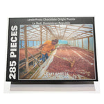 Load image into Gallery viewer, Puzzle showing a cacao farmer inspecting cacao beans in a solar dryer
