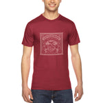 Load image into Gallery viewer, Men&#39;s cranberry - A man wearing a tshirt with a white letterpress chocolate logo
